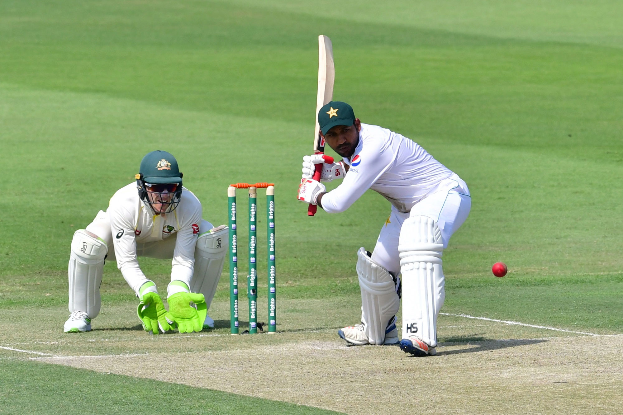 Pakistani cricketer Ahmed Sarfraz plays a shot during day one of the second Test cricket match in the series between Australia and Pakistan at the Abu Dhabi Cricket Stadium in Abu Dhabi on October 16, 2018. (Photo by GIUSEPPE CACACE / AFP)