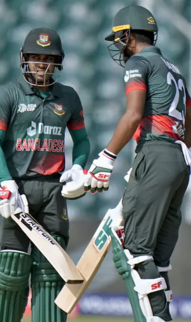 Mehidy Hasan and Naim celebrating their fifty-run stand