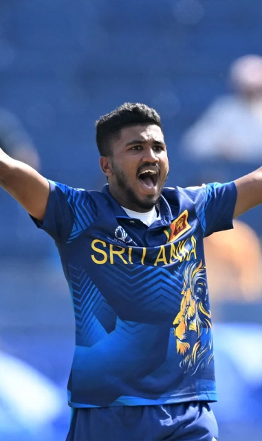 Dilshan Madushanka celebrates after taking wicket