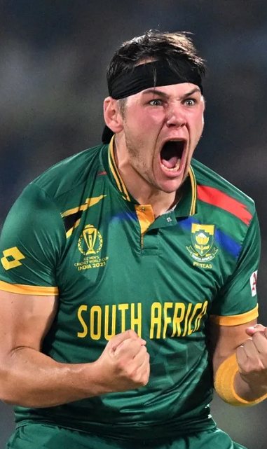 Gerald Coetzee celebrates his first ODI World Cup wicket