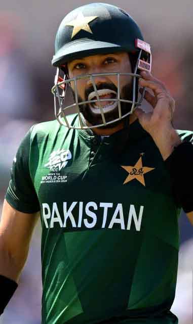 Mohammad Rizwan walks back towards the pavilion