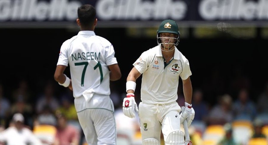 Warner hits century as Australia take control of Brisbane Test